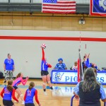 Tenly Zierlen spikes the ball at Ten Sleep’s homecoming game. The Ten Sleep/Riverside combo team won the match. Stephanie Olsen