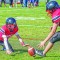 Riverside Middle School’s Parker Caillier, left, and Ozzie Ortiz jump on a loose ball in the endzone during the final seconds of their game against Midwest Middle School last Friday afternoon in Basin. Lisa Kunkel