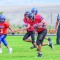 Sawyer Triplett runs down the field with the fall during the Riverside Middle School Homecoming game on Friday. Roxanne Petersson