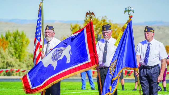 American Legion Post 29 members (l-r) John Bubla, Chuck Hopkin and Steve Crane. They presented the flags for the Riverside Military Appreciation Game. Lisa Kunkel