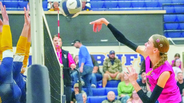 Burlington’s Sarah McNiven goes for the kill shot while playing Greybull on Oct. 20 in the Buff Gym. Lisa Kunkel